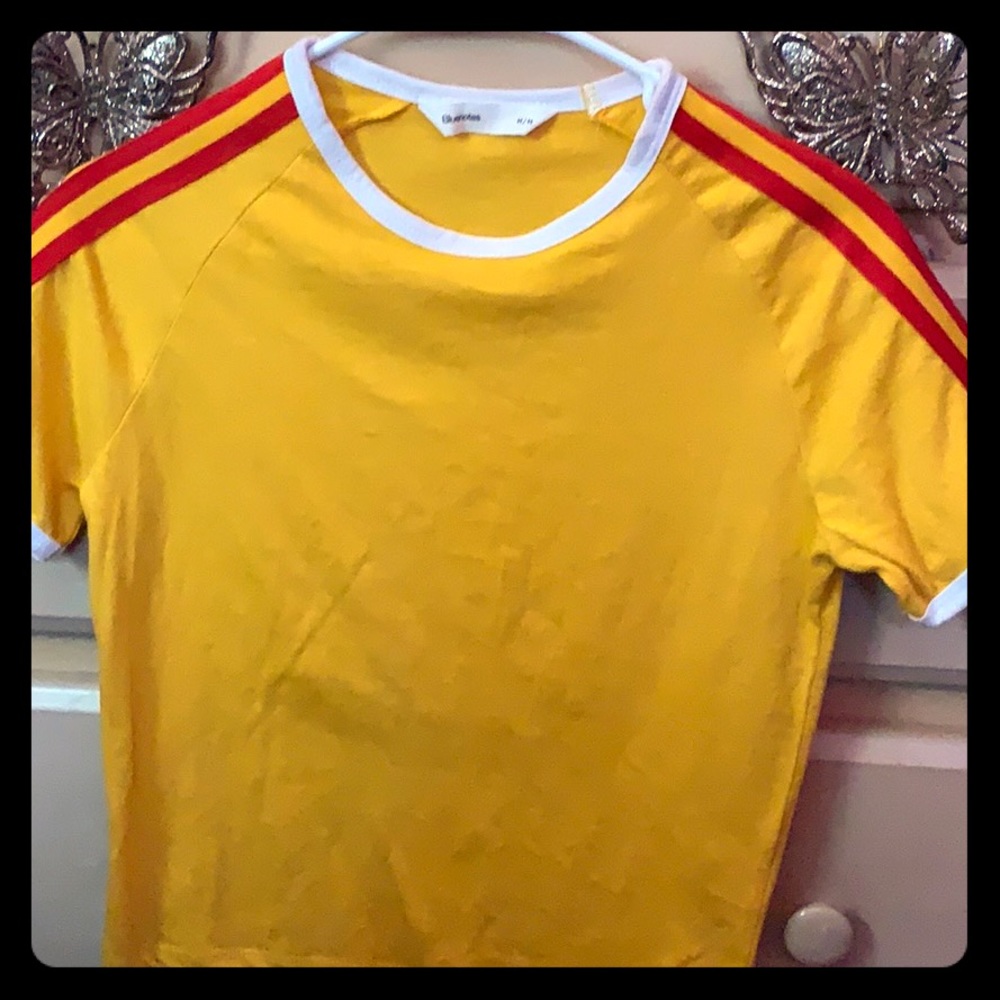 Yellow crop top with two yellow strips on sleeves